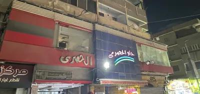 محل للبيع في ميدان المحطة حلوان شارع تجاري و حيوي 24ساعة