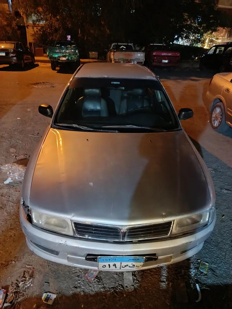 لانسر كريستالة كاملة مانيوال ٩٩