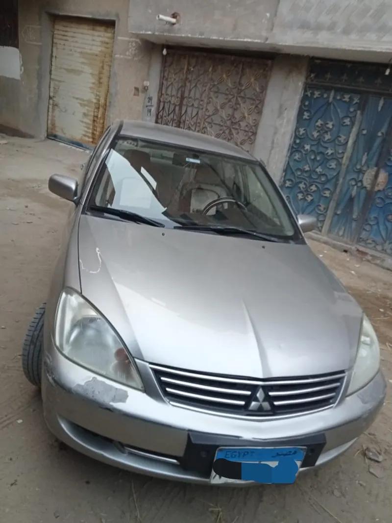 ميتسوبيشي لانسر2012 بومه فبريكا برا وجوا