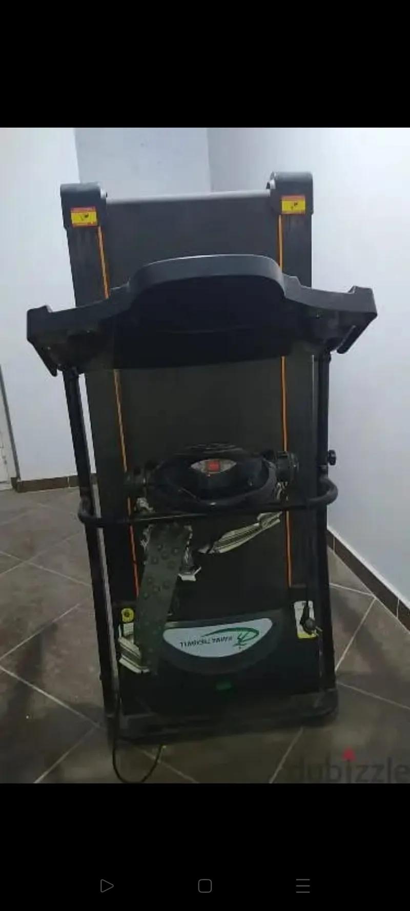 مشاية كهرباء مزودة بجهاز للمساج والتخسيس