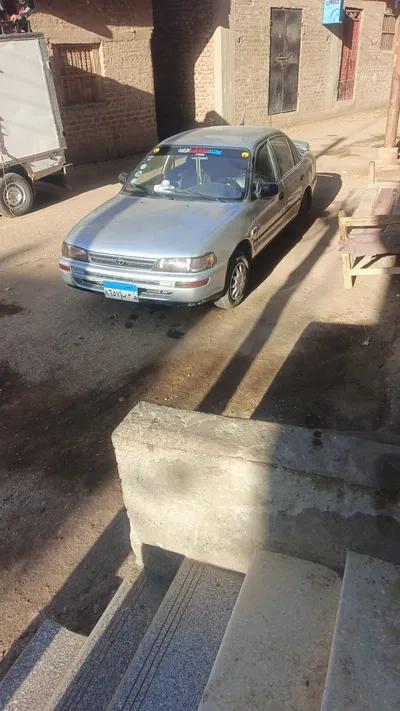 تويوتا كورولا موديل ٩٧ خليجي زيرو دواخل بالكامل راشه بره في سوهاج, مركز سوهاج - 300,000 جنيه