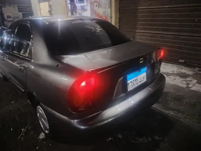 لانوس ٢٠١٠ فيراني من الخارج ابيض من الداخل تعمل بكفائه تكييف in Giza, Imbaba - 205,000 EGP