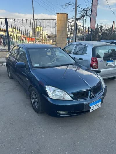 لانسر بومه اتوماتيك 2004 in Cairo, Downtown Cairo - 400,000 EGP