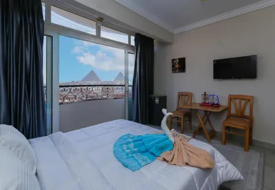 فندق صن رايز ( في قلب اهرامات الجيزة )متوفر غرف دبل تربل سنجل  in الجيزة, الهرم - 800 EGP