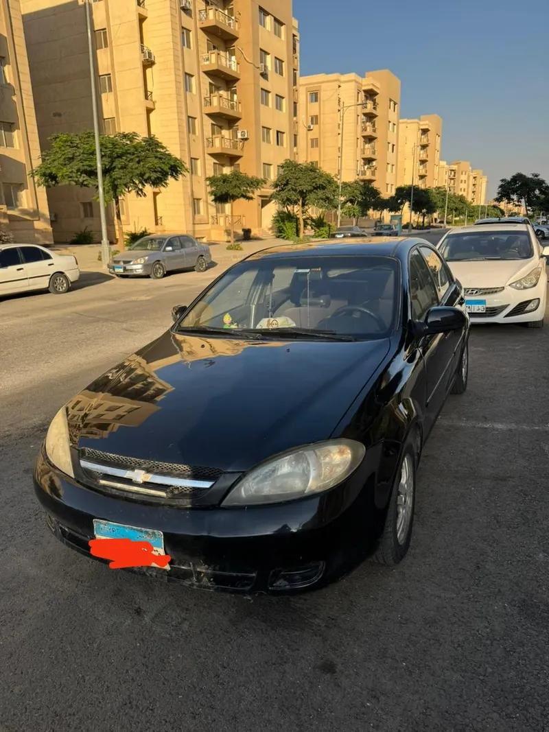 اوبترا هاتش باك 2006